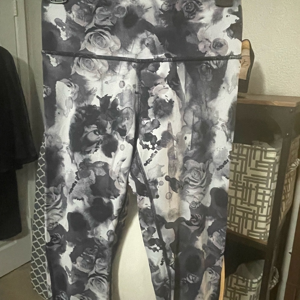 Lululemon High‎ Times leggings with open stitching along back of legs.